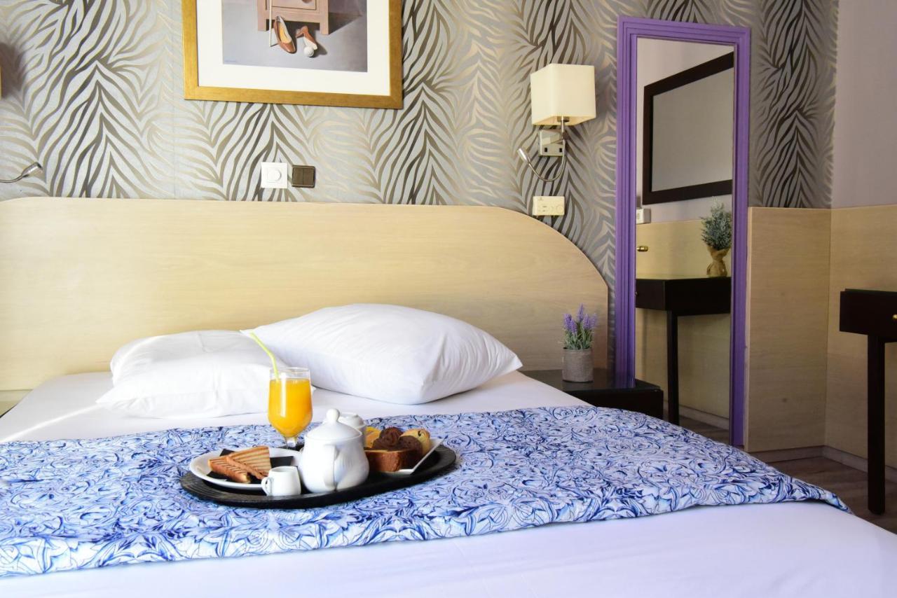 Eva Hotel Pireo Esterno foto